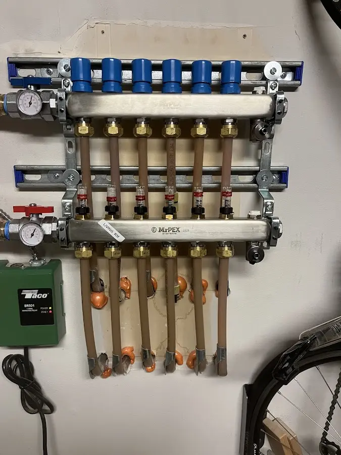 Plumber performing Gas Line Installation at a residential property in Hadley